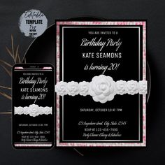 a black and white birthday party with flowers on the front, and an iphone in the back