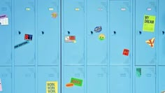 several blue lockers with stickers and magnets attached to the doors are shown