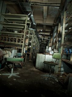 an old run down warehouse with lots of shelves