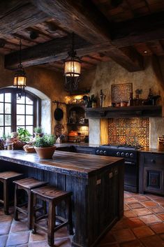 a rustic kitchen with an island in the middle