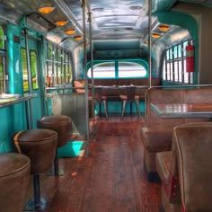 the interior of an old bus with leather seats and wood flooring is shown in this image