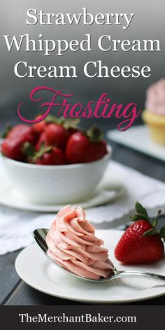 strawberry whipped cream cheese frosting on a plate with strawberries