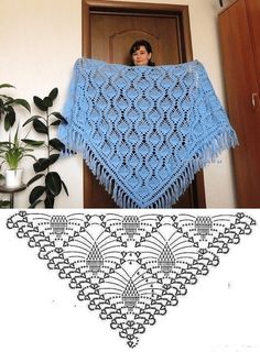 there is a crocheted shawl with fringes on it