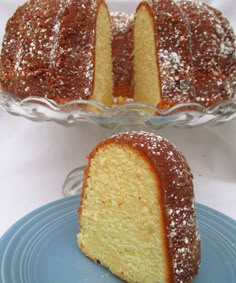 a bundt cake on a plate with one slice cut out