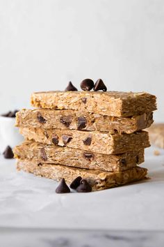 three bars stacked on top of each other with chocolate chips