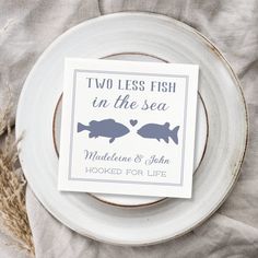 two less fish in the sea card on a plate