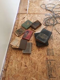 there are many books on the floor with wires