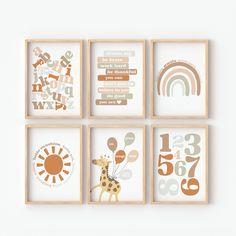 four framed pictures with different animals and numbers on them, each one has a giraffe