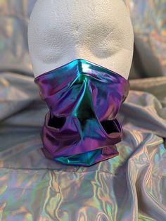 -THIS ITEM IS NOT A MEDICAL GRADE MASK -THIS ITEM CANNOT BE MACHINE WASHED -Mask measures approximately 12 in tall from nose to neck and about 20 in around   -One size fits most -Sewn together down back of gaiter -Heavy weight 95% polyester, 5% spandex blend -Not all bandanas in my shop use the same style/weight fabric -Spot clean with soap and water if necessary -Perfect for raves and outdoor festivals! Shipping within the US USPS First Class Package 3-9 days USPS Priority Mail 1-5 days USPS Priority Mail Express 1-3 days Shipping International  USPS First Class Mail International  -Varies- USPS Priority Mail International 6-14 days USPS Priority Mail Express International 3-9 days Shipping times are estimated, NOT GUARENTEED.  +International buyers are responsible for all import fees+ +O Iridescent Outfit Holographic Fashion, Festival Bandana, Iridescent Fashion, Holographic Accessories, Holographic Fashion, Holographic Iridescent, Rave Mask, Clothing Reference, Accessories Inspiration