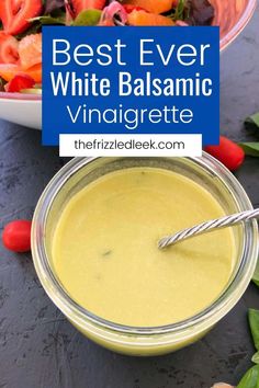 the best ever white balsamic vinaigrette is in a glass bowl