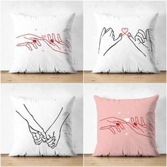 four pillows with hand drawn hands holding each other