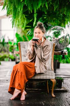 greenhouse photoshoot photo idea, sitting in the middle of the greenhouse barefoot with beautiful green ferns and a disco ball :)