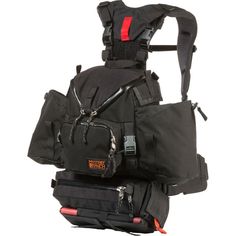 three different types of backpacks stacked on top of each other, one black and the other red