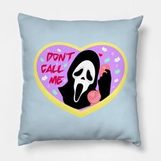 a blue pillow with a cartoon image of a ghost holding a heart and the words don't call me on it