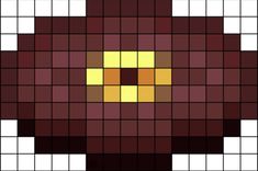 an animal made out of squares in brown, yellow and white colors with the shape of a bear's head