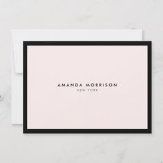 a pink and black business card with the word amanda morrison on it in white ink