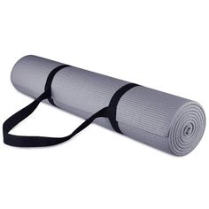 a pink yoga mat with black straps