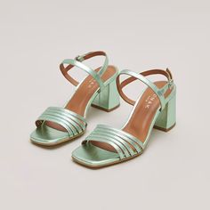 Square toe sandals with straps in light green metallic leather | Jonak Sandals With Straps, Square Toe Sandals, Open Toed Heels, Flowing Skirt, Model Fits, Toe Sandals, Platform Boots, Shoe Style, Metallic Leather