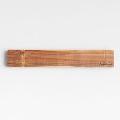 a piece of wood that is on the wall