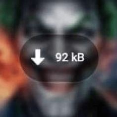 the dark knight joker face is shown in this blurry photo, with an arrow pointing to