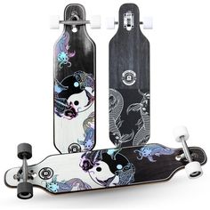 two skateboards with designs on them sitting next to each other