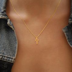 Delicately understated, the Gold Tiny Cross Necklace embodies simplicity and elegance, making it an ideal present for cherished individuals. Adorn it with self-assuredness, embracing its essence as a representation of both strength and spiritual connection. This classic design is perfect for any occasion, from casual to dressy. PRODUCT DETAILS: Material: 14K Solid Gold Choice of Gold Color: Yellow Gold, Rose Gold, White Gold Pendant Height: 12 mm Pendant Width: 0.6 mm Adjustable Length Closure: Crown Of Thorns Necklace, Unique Cross Necklace, Location Names, Chain Cross Necklace, White Gold Cross Necklace, Cross Necklace Gold, Dainty Cross Necklace, Tiny Cross Necklace, Cross Necklace Women