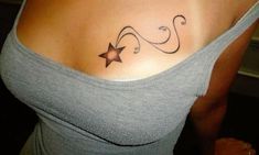 a woman with a star tattoo on her chest