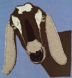 a brown and white cow is shown on a blue background