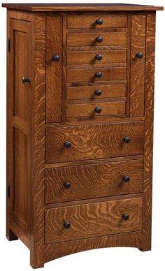 a wooden chest with five drawers and two doors