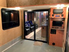 the inside of an rv with its doors open