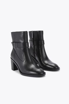 The Stirling ankle boot features a black leather upper. There is a strap around the ankle with subtle black metal branded loops. Heel height: 70mm. Petite Jumpsuit, Trending Boots, Lace Skater Dress, Stirling, Sunglasses Shop, Fit N Flare Dress, Boots For Sale, Denim Outfit, Jeans For Sale