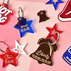 six star shaped keychains with the words hot dog, slar, and cherry cola on them