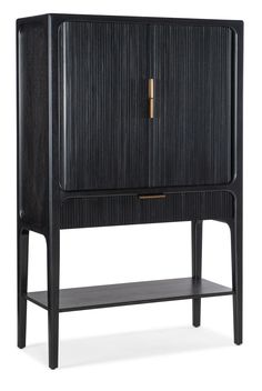 a black cabinet with gold handles on the top and bottom shelf, against a white background