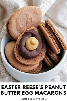 a bowl filled with peanut butter egg macarons