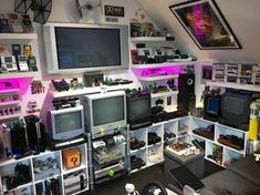 a room filled with lots of different types of electronic devices and electronics on shelves next to each other