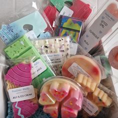 a box filled with lots of different types of soaps