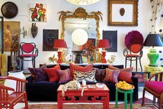 a living room filled with lots of colorful furniture