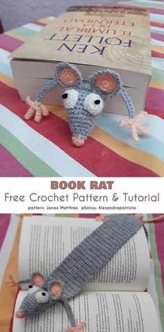 two crocheted mice sitting on top of an open book