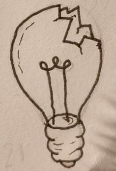 a drawing of a light bulb with an arrow drawn on it