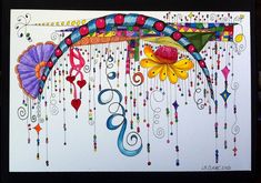 an art work with colorful designs on white paper and black frame, hanging from the wall