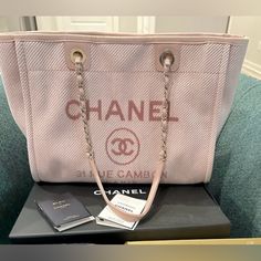 Chanel Pink Canvas Tote Bag Comes With Authentication Card, Dust Bag And Chanel Box. Never Used, In Excellent Condition 16” L 10” H 4” W Large Luxury Bags With Removable Pouch, Large Luxury Shopping Bag, Luxury Large Shoulder Bag With Removable Pouch, Luxury Large Capacity Pink Shoulder Bag, Elegant Large Bags With Large Capacity, Large Luxury Beige Bag, Luxury Large Beige Bag, Large Elegant Beige Shoulder Bag, Elegant Large Shoulder Bag For Shopping