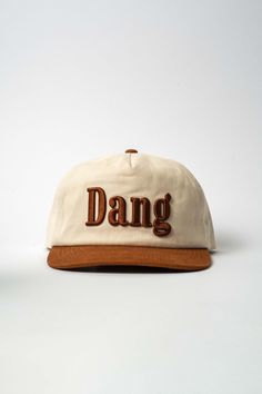 The best DANG hat ever. Inspired by the 1 of 1 Chore Set our friend and local Austin artist, Erik Ross, created. Raised Embroidery, 1 Of 1, Hat Shop, Burnt Orange, Cotton Twill, Cowboy Hats, Trucker Hat, Austin, Cowboy