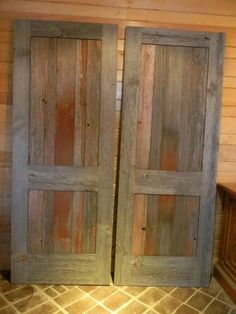 two wooden doors sitting next to each other