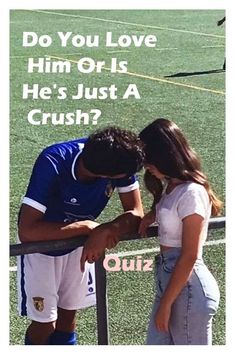 a man and woman standing next to each other on a soccer field with the caption do you love him or is he's just a crush?