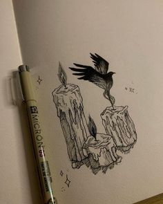 a drawing of two candles with a bird flying over them