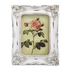 a white frame with a pink rose painted on the front and bottom, along with two green leaves