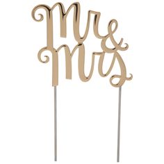 a cake topper with the word mr and mrs on it's wooden stick