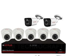 four security cameras sitting on top of a black and white box with the words ip plus