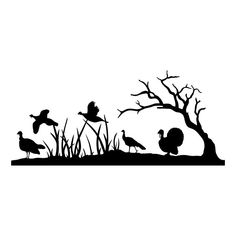 the silhouettes of birds and trees are shown