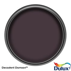 a dark purple color with the words duluxx on it and an image of a black